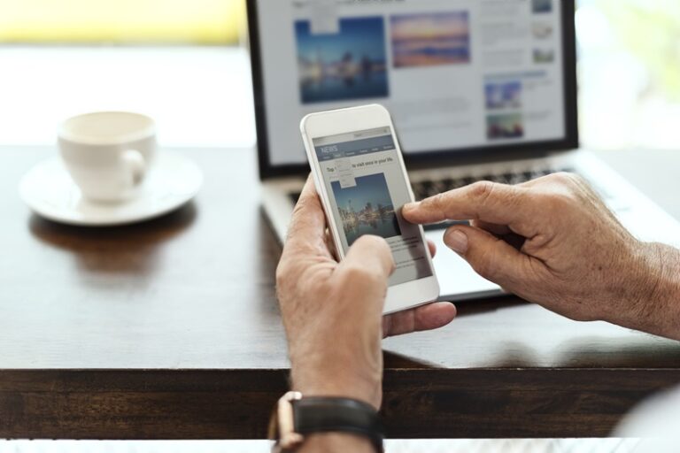 Elderly man is using mobile phone